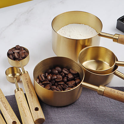 stainless-steel-with-wooden-gold-measuring-cups. jpg