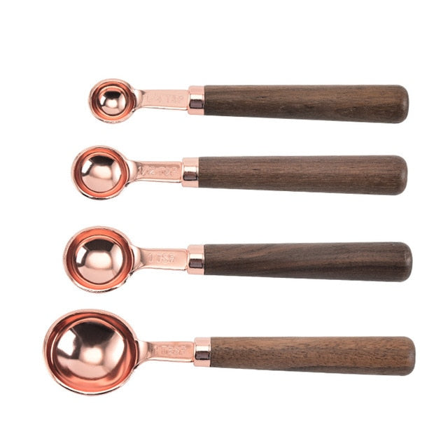 stainless-steel-with-wooden-gold-measuring-cups. jpg