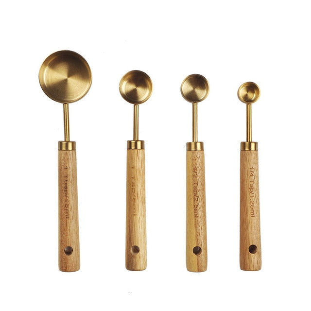 stainless-steel-with-wooden-gold-measuring-cups. jpg